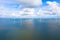 Aerial view, Enormous windmills stand in the sea along a dutch sea. FryslÃ¢n wind farm.