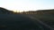 Aerial view on epic valley with field and mountans background. Shot. Sunny morning in mountain. Beautiful landscape