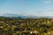 aerial view of european town in mountains on sunset,