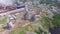 Aerial view of evaporating water from cooling tower of metallurgical plant