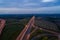 Aerial view on evening traffic on motorway junction