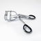 Aerial view of eyelash curler with black handles isolated on white background. Beauty accessory, close up