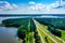 Aerial view of Falls Lake in North Carolina and interstate highway with a cloudy blue sky