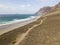 Aerial view of Famara beach, Lanzarote, Canary Islands, Spain. Risco di Famara, relief, mountains overlooking the Atlantic Ocean