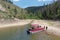 Aerial view of family and friends on pontoon boat on Lake Granby, Colorado.