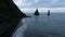 Aerial view of the famous black Icelandic beach and cliffs. Andreev.