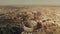 Aerial view of famous Colosseum or Coliseum amphitheatre within cityscape of Rome, Italy