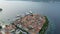 Aerial view of famous Croatian island Korcula, with mediterranean architecture, marina and luxury yachts and sailboats embarked.