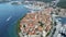 Aerial view of famous Croatian island Korcula, with mediterranean architecture, marina and luxury yachts and sailboats embarked.