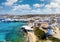 Aerial view of the famous windmills above the town of Mykonos island, Cyclades, Greece