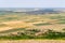 Aerial view of farm lands with crop fields in Dobrogea, Romania. Agriculture in south-east of Europe