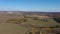 Aerial view. Farm in the midst of autumn fields.