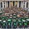 aerial view of farmer activist drive tractor and truck march reach city for agriculture ban protest