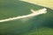 An aerial view of farmland irrigated with center pivot sprinkler systems.