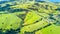 Aerial view on a farmland at sunny day. Whangaparoa peninsula, Auckland, New Zealand