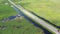 Aerial view of a fast trucks on the road in countryside