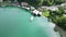 Aerial view of ferry leaving boathouse at lake Tegernsee in Bavaria, Germany