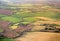 Aerial view on field plots in contrasting colours