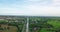 Aerial view of Fields with various types of agriculture and Irrigation canal in rural Thailand