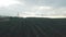 Aerial view of fields of wheat and power lines