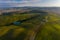 Aerial view of the fields, wineries near San Quirico d`Orcia. Tuscany autumn sunrise