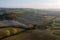 Aerial view of the fields, wineries near San Quirico d`Orcia. Tuscany autumn sunrise