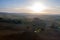 Aerial view of the fields, wineries near San Quirico d`Orcia. Tuscany autumn sunrise