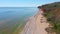 Aerial view of the final stage of the Enduro extreme race on the seashore in 4K.