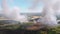 Aerial View of Fire in Wheat Field. Flying over Smoke above Agricultural Fields