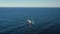 Aerial view of a fishing boat sailing in the Atlantic Ocean