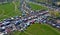 Aerial view on flea market with miscellaneous items and crowds of buyers and seller`s makeshift stands