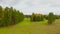 Aerial view flight over fields and forests in autumn day