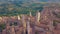 Aerial view. Flight over a mediaeval town of Fine Towers, San Gimignano, Tuscany, Italy