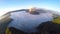 Aerial view flight over Mount Bromo volcano during sunrise.