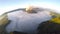 Aerial view flight over Mount Bromo volcano during sunrise.