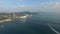 An aerial view fly over Tsing Ma Bridge under sunny day