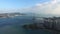 An aerial view fly over Tsing Ma Bridge under sunny day