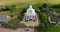 aerial view and flyby over old temple or catholic church in countryside