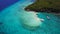 Aerial view flying over amazing of sandy beach clear sea water of the Sumilon island beach landing near Oslob, Cebu, Philippines.