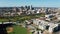 Aerial view flying in over ball park towards downtown Birmingham Alabama