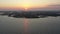 Aerial View Flying Over Bay Into Sunrise