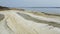 Aerial view, flying over the salty sands of the litoral zone on Kuyalnik Liman.