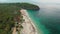 Aerial view flying over the tropical virgin beach, Bali island. Asia.