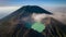Aerial view flying to mount Kawah Ijen crater, Sulfur mining in an active volcano, Java, Indonesia