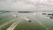 Aerial view of flying to the right behind Staten Island Ferry as it approaches downtown NYC