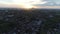 Aerial view flying towards Philadelphia sunset