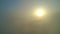 Aerial view of fog in spring. Sunrise above the clouds.