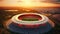 Aerial view of a football stadium at sunset. Sport concept