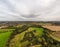 Aerial view, forest trees, woodland, deciduous temperate fog, lowland, Britain, UK, England, sunset Sunrise.