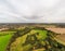 Aerial view, forest trees, woodland, deciduous temperate fog, lowland, Britain, UK, England, sunset Sunrise.